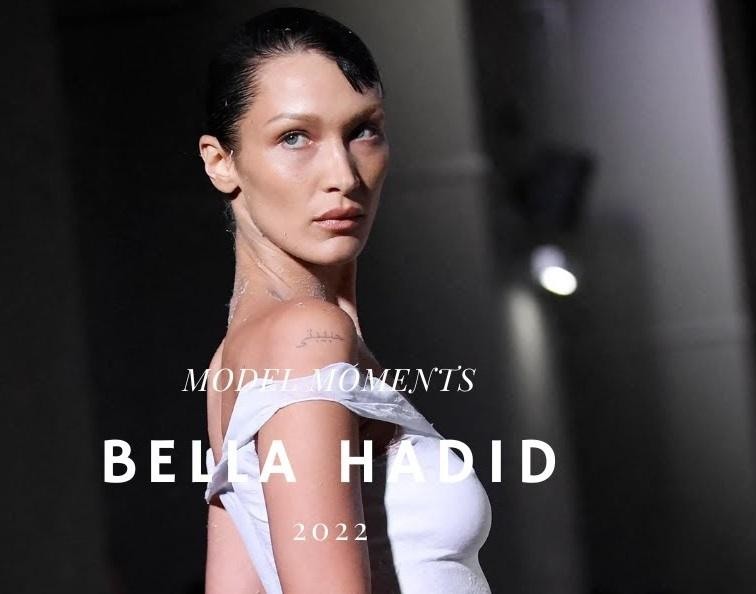 Alt: Bella Hadid na wybiegu podczas pokazu mody, prezentująca awangardową stylizację.