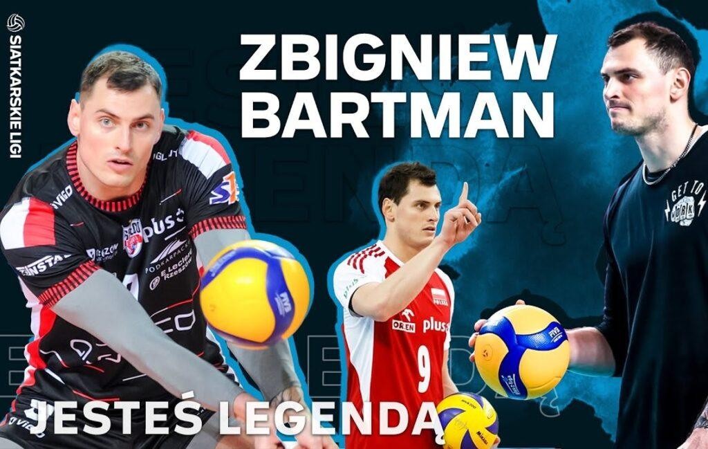 Zbigniew Bartman w akcji podczas meczu siatkówki, wykonujący potężny atak nad siatką, z widoczną determinacją na twarzy.
